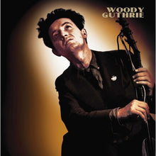 Load image into Gallery viewer, Woody Guthrie - This Machine Kills Fascists [Ltd Ed Gold with Black Splatter Vinyl]
